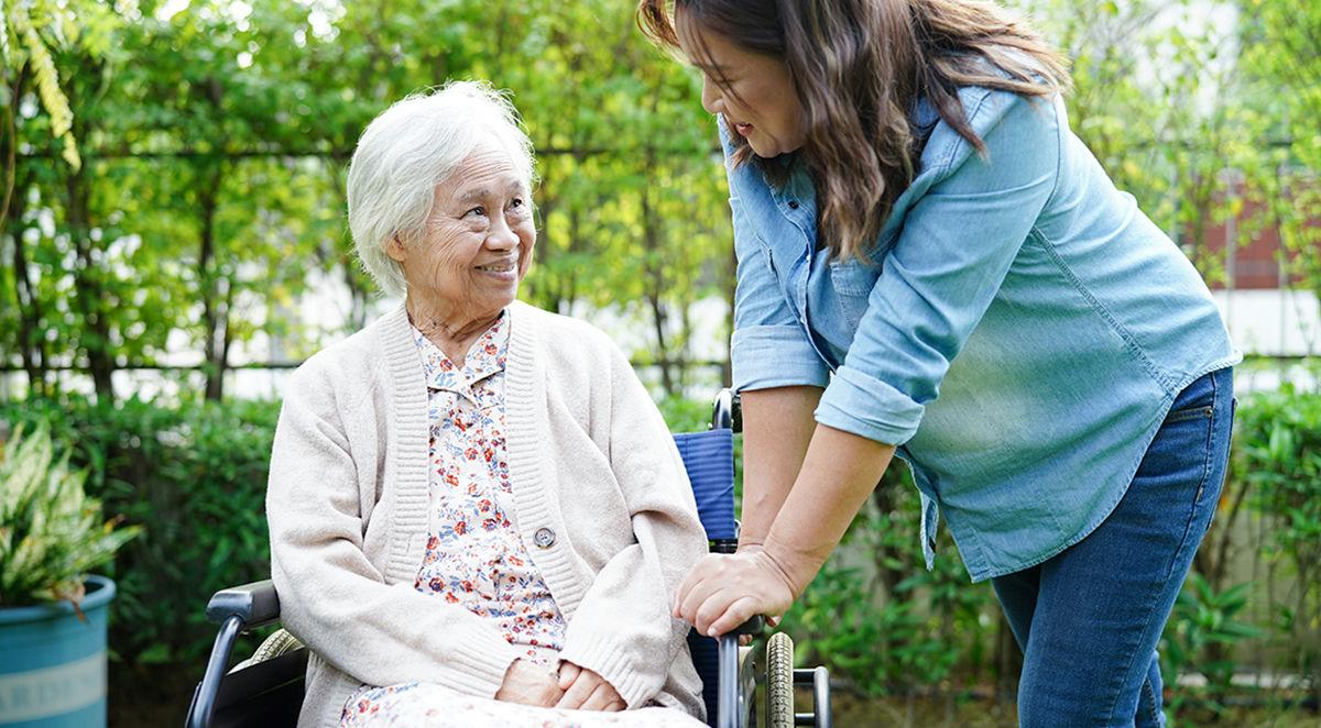 caregiver-helping-elderly-woman Accessible Transportation Blog | Asheville, NC